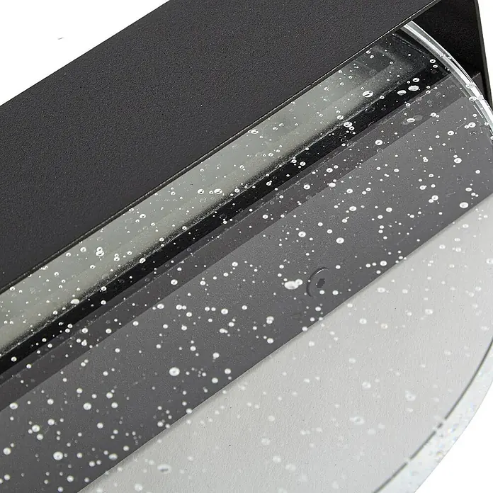 Lucande Außenwandleuchte Narkelo - schwarz, klar / transparent, IP44 - Schwarze, texturierte Leuchte mit gesprenkelter Glasplatte und sichtbarer Schraube.