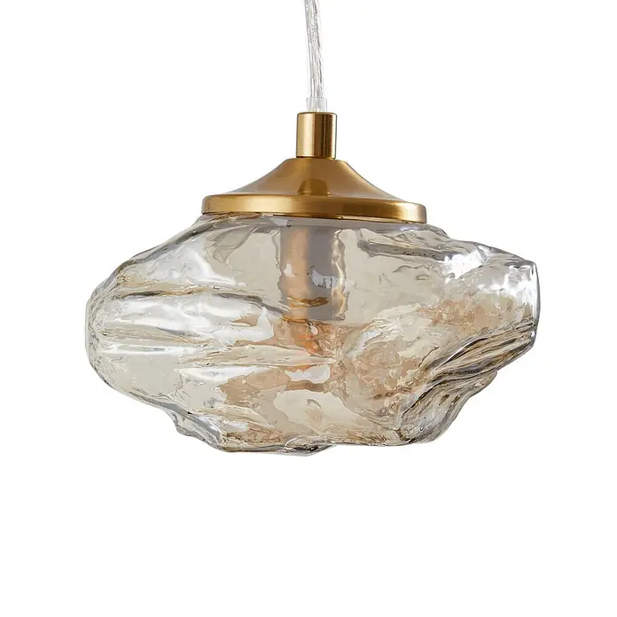 Lindby Pendelleuchte Piatra - L x B x H: 25 x 25 x 150 cm, creme / amber, amber, messing, G9 - Pendelleuchte mit bernsteinfarbenem, gehämmertem Glasschirm und Messingaufsatz.