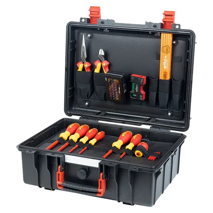 Wiha Werkzeugkoffer Basic Set L VDE - 46 -tlg. - Offener schwarzer Werkzeugkoffer mit roten Akzenten, enthält isolierte Schraubendreher, Zangen und einen Gliedermaßstab.