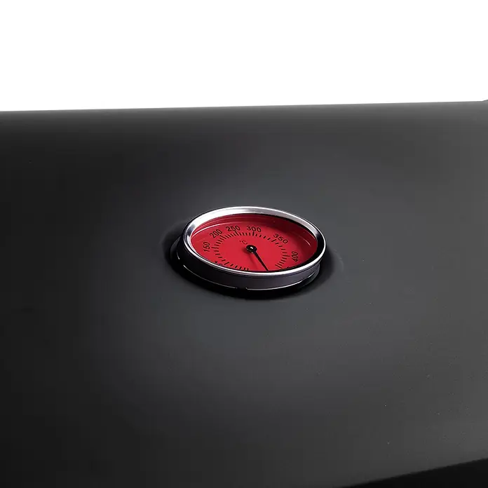 TAINO Gasgrill RED 4+1 - Anzahl Brenner: 4 Stk. - Rundes Thermometer mit rotem Zifferblatt und silbernem Rand, eingebettet in einem schwarzen Grill- oder Ofendeckel, zeigt die Temperatur an.