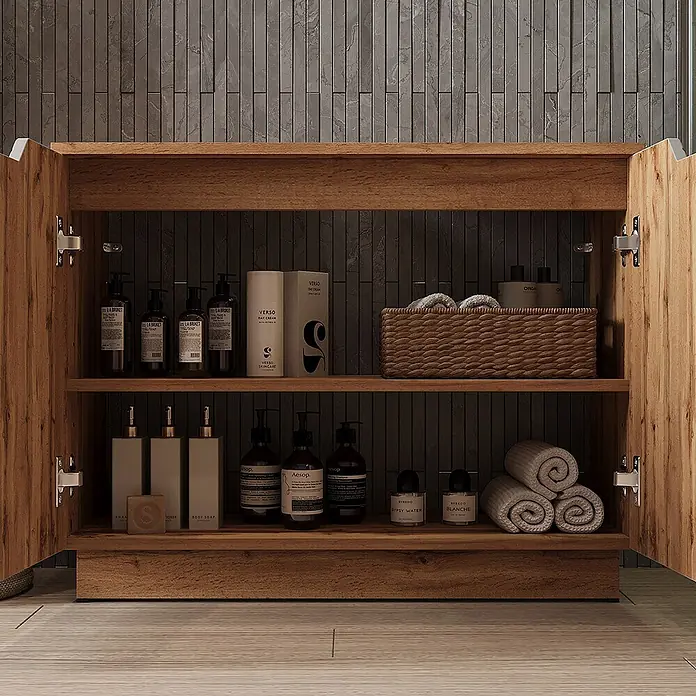 Vicco Badmöbel-Set Lotta Grau 2 Teile - Grau, Matt - Offener Badezimmerschrank aus Holz mit zwei Regalböden, bestückt mit Pflegeprodukten, einem Korb und gerollten Handtüchern.