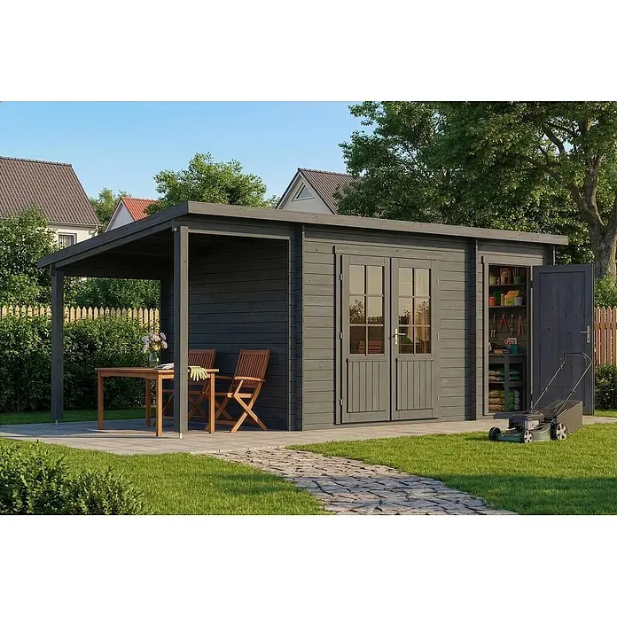 Alpholz Gartenhaus Maria - Außenmaß inkl. Dachüberstand (B x T): 598 x 272 cm, Holz, Grau - Dunkelgraues Holzgartenhaus mit integriertem Seitenanbau, der einen Terrassenbereich mit Tisch und Stühlen und einen Abstellraum zeigt.