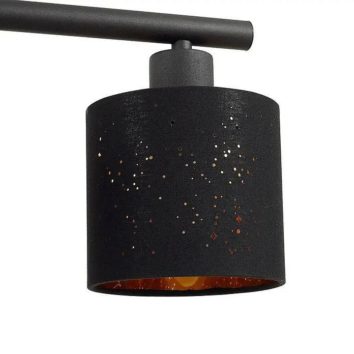 Lindby Pendelleuchte Vasilia - L x B x H: 75 x 12 x 11 cm, schwarz, Schwarz, gold, E14 - Schwarzer zylindrischer Stofflampenschirm mit Stern- und Punkt-Ausschnitten, goldener Innenseite und Glühbirne, an schwarzer Metallstange.