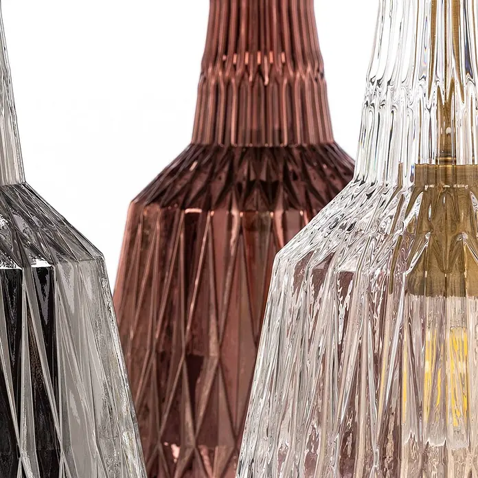 Lindby Pendelleuchte Belarion - L x B x H: 65 x 65 x 35 cm, Multicolour, bernstein, rauchgrau, hellGrün, transparent, Kupfer, E27 - Drei Pendelleuchten aus strukturiertem Glas: silbern, kupferfarben und klar mit sichtbarer Glühbirne.