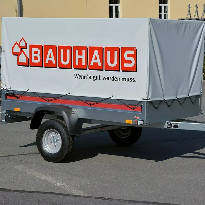 Stema Anhänger BH 7.5-20-12.1 - Nutzlast: 605 kg, Einachser, Ungebremst - Der abgedeckte Anhänger von Bauhaus präsentiert sich mit Reifen und einem grau-roten Design. Ideal für Heimwerker und Profis!