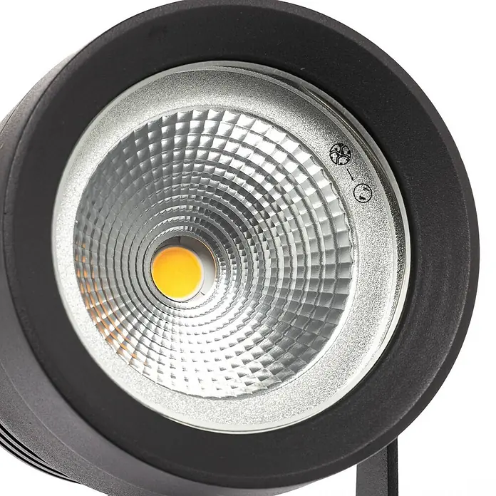 Lucande Erdspießleuchte Irina -  - Schwarzer LED-Strahler mit silbernem Texturreflektor und warmgelber COB-Lichtquelle.