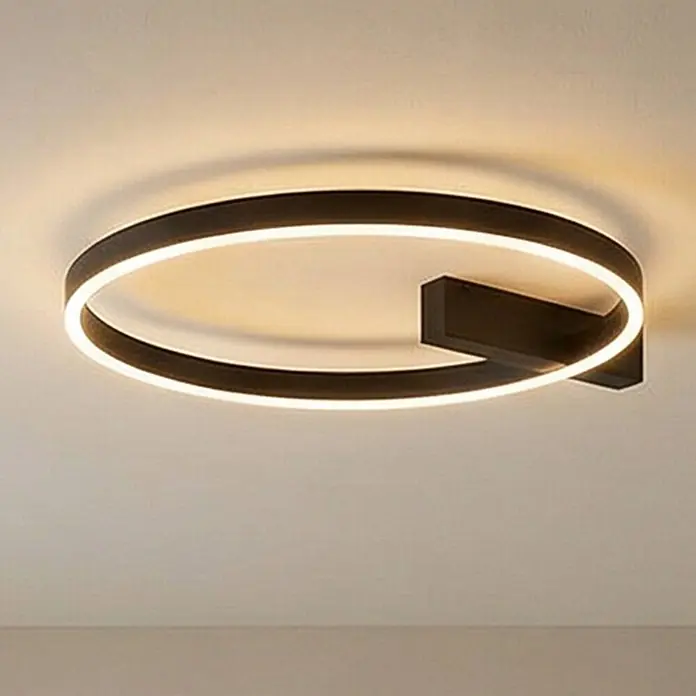 Lucande Deckenleuchte Isalin - schwarz - Moderne schwarze LED-Deckenleuchte, kreisförmig, mit warmweißem Licht in Ringform, an der Decke montiert.
