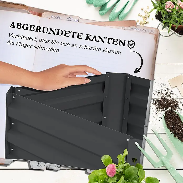 Outsunny Hochbeet - Stahl, Dunkelgrau - Dunkelgraues Metall-Hochbeet mit abgerundeten Kanten. Eine Hand berührt die sichere Oberseite.