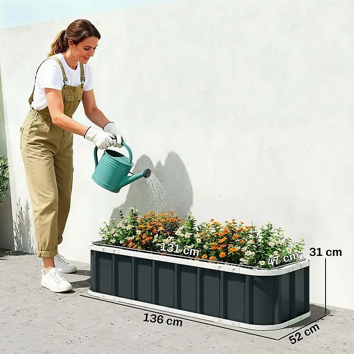 Outsunny Hochbeet - Stahl, Dunkelgrau - Großes dunkelgraues Hochbeet mit weißem Rand, 136x52x31 cm, für Blumen verwendet.