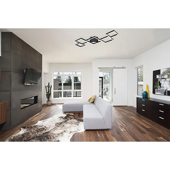 Globo LED-Deckenleuchte Kurio - 58 W, L x B x H: 120 cm x 60 m x 6 m, Schwarz, Kaltweiß - Moderne schwarze geometrische Deckenleuchte mit beleuchteten Quadraten, die einen Wohnraum erhellt.