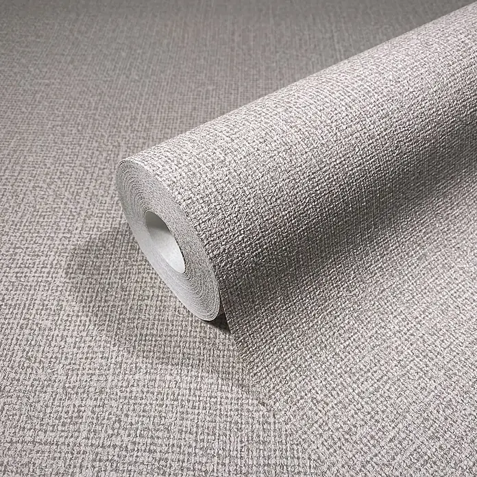 Vliestapete - Braun, Sonstiges, 10,05 x 0,53 m - Rolle strukturierter hellgrauer Tapete mit Webmuster, teilweise abgerollt.