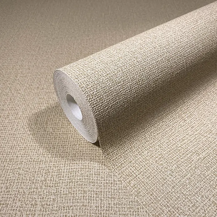 Vliestapete - Beige, Sonstiges, 10,05 x 0,53 m - Rolle strukturierter, hellbeiger Tapete, teilweise abgerollt, zeigt ihr Webmuster.