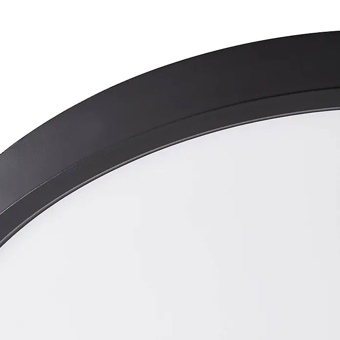 Lindby Deckenleuchte Pravin - schwarz - Nahaufnahme einer modernen runden Leuchte mit matt dunkelgrauem Metallrand und weißem Diffusor.