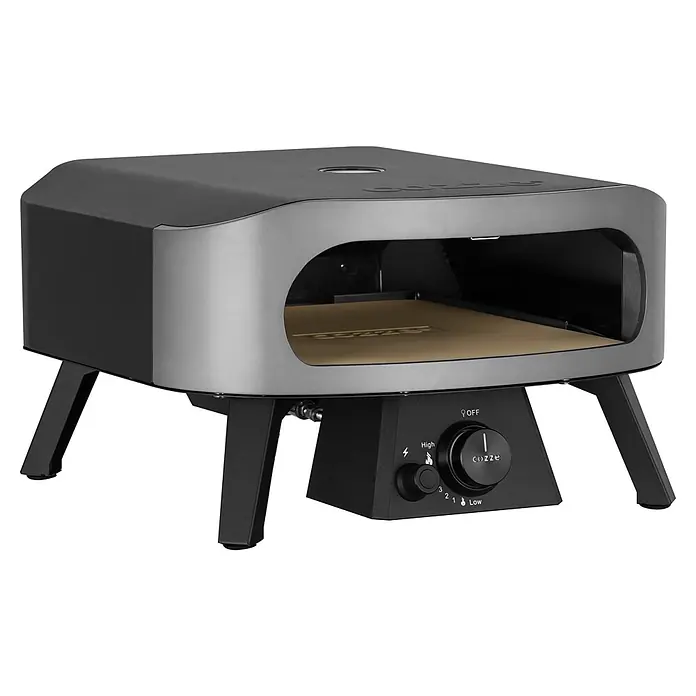 Cozze Pizzaofen Classic 13 - Grillfläche (B x T): 34 x 34 cm, 6 kW - Schwarzer und silberner Outdoor-Pizzaofen mit Frontöffnung, Bedienknopf und vier Beinen.