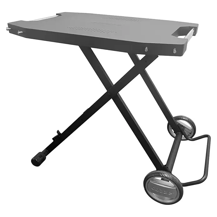 Cozze Mesa plegable - An x Pr x Al: 104,5 x 62,5 x 78 cm, Acero - Soporte de parrilla gris portátil con estructura plegable negra, parte superior perforada, ruedas y pie ajustable.