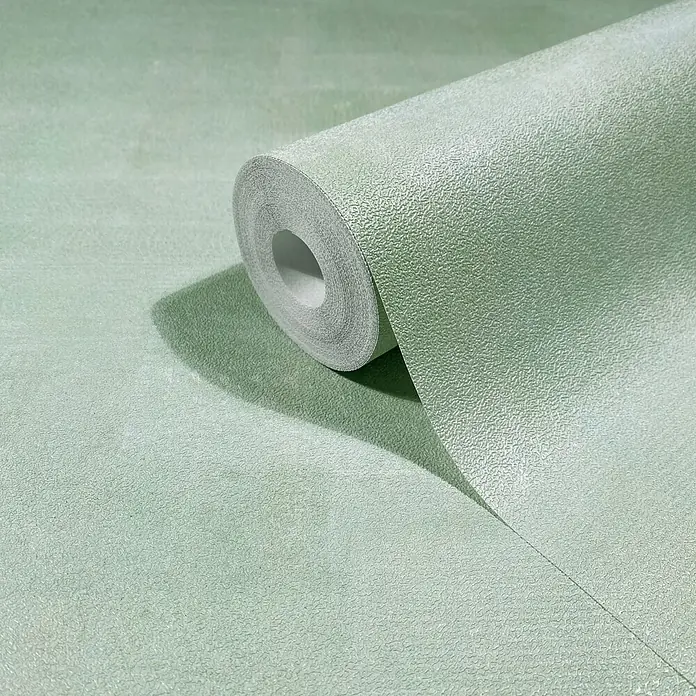 Marburg Novamur Plus Fresh UP Vliestapete Uni I - Grün, Uni, 10,05 x 0,53 m - Hellgrüne strukturierte Tapetenrolle, teilweise abgerollt, zeigt ihre granulierte Oberfläche.