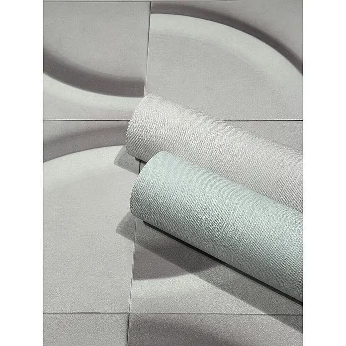 Marburg Shades Iconic Vliestapete Grafik I - Grau, Grafisch, 10,05 x 0,53 m - Zwei Rollen strukturiertes Material, hellgrau und hellblau-grün, auf einer grau gemusterten Oberfläche.