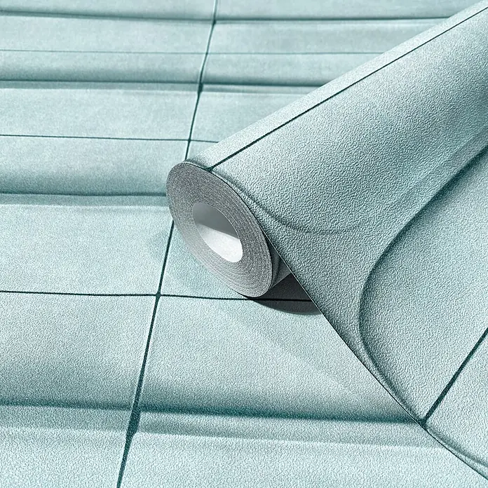 Marburg Shades Iconic Vliestapete Grafik III - Blau, Grafisch, 10,05 x 0,53 m - Texturierte türkisfarbene Tapetenrolle mit Gittermuster, teilweise abgerollt.