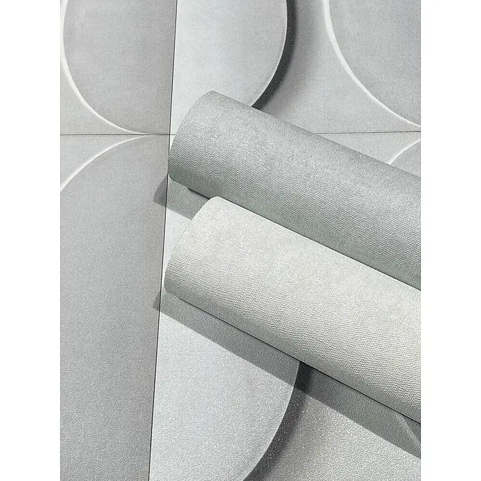 Marburg Shades Iconic Vliestapete Grafik V - Grau, Grafisch, 10,05 x 0,53 m - Zwei Rollen aus hellgrauem strukturiertem Material.