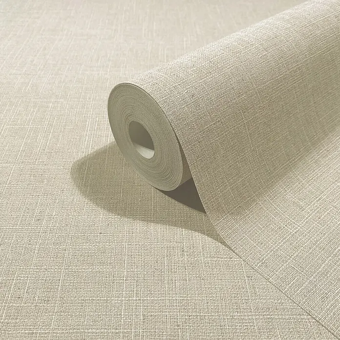 Marburg Boho Vliestapete Uni - Beige, Uni, 10,05 x 0,53 m - Helle beige Tapetenrolle mit Leinenstruktur, teilweise abgerollt.
