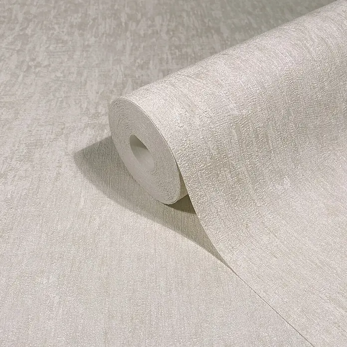 Marburg Ritus Vliestapete Uni - Beige, Uni, 10,05 x 0,53 m - Helle beige strukturierte Tapetenrolle, teilweise abgerollt, zeigt ihre gemusterte Oberfläche.