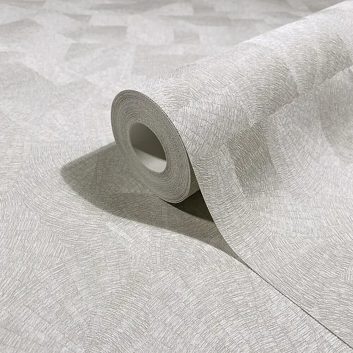 Marburg Whisper Vliestapete Grafik I - Grau-Beige, Grafisch, 10,05 x 0,53 m - Helle graue Tapetenrolle mit geometrischem Strukturmuster, teilweise abgerollt.