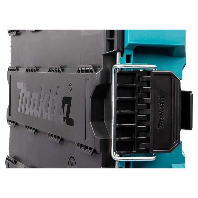 Makita Werkzeugkasten Maktrak M - Kunststoff, L x B x H: 56,2 x 38,7 x 16,2 cm - Dunkelgrauer Makita Werkzeugkoffer mit schwarzen Verschlüssen und Metallgriff, mit Makita-Logo und einem türkisen Element.