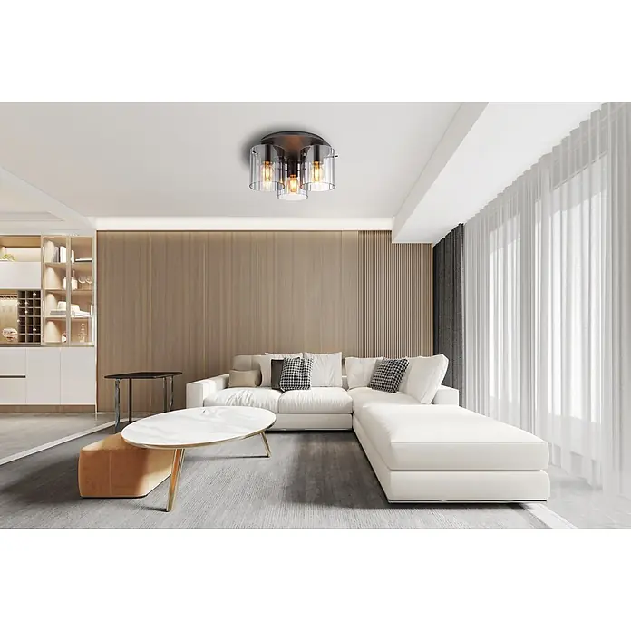 Globo Deckenleuchte Tulivar - 40 W, E27 - Schwarze Deckenleuchte mit drei klaren Glasschirmen und sichtbaren Edison-Glühbirnen in einem Wohnzimmer.