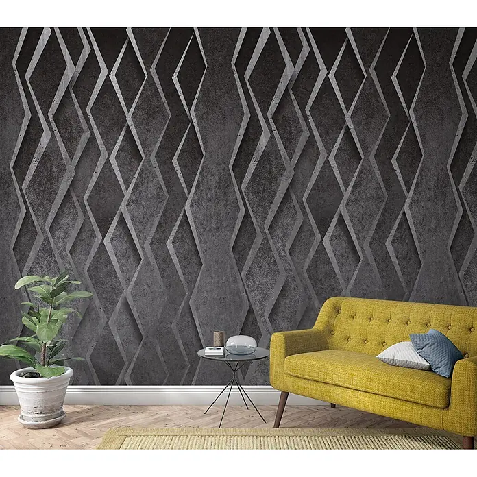 Marburg Smart Art Aspiration Fototapete Grafik I - B x H: 159 mm x 270 cm, Vlies, Anthrazit - Dunkelgraue 3D-Tapete in Betonoptik mit geometrischem Rautenmuster hinter einem gelben Sofa.