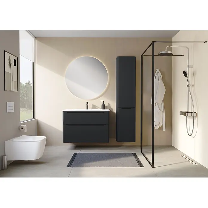 VitrA Integra Round Badmöbel-Set - Gesamtbreite Badmöbel: 100 cm, Graphit, Matt - Moderne dunkelgraue Badmöbelgarnitur mit weißem Waschbecken und passendem Hochschrank in einem Badezimmer mit Dusche.