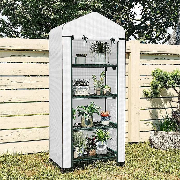 Furnicato Gewächshaus - 50 x 69 cm, Material Seitenwand: Stahl, 14 mm, weiß - Weißes Gewächshaus mit grünen Regalen und Topfpflanzen, draußen in einem Garten.