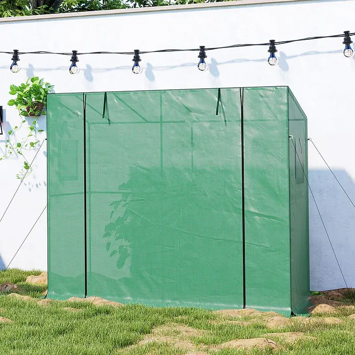 Outsunny Gewächshaus - 200 x 76 cm, Material Seitenwand: Kunststoff, 0,3 mm, Dunkelgrün - Kleines grünes tragbares Gewächshaus aus transluzentem verstärktem Stoff, im Freien platziert.
