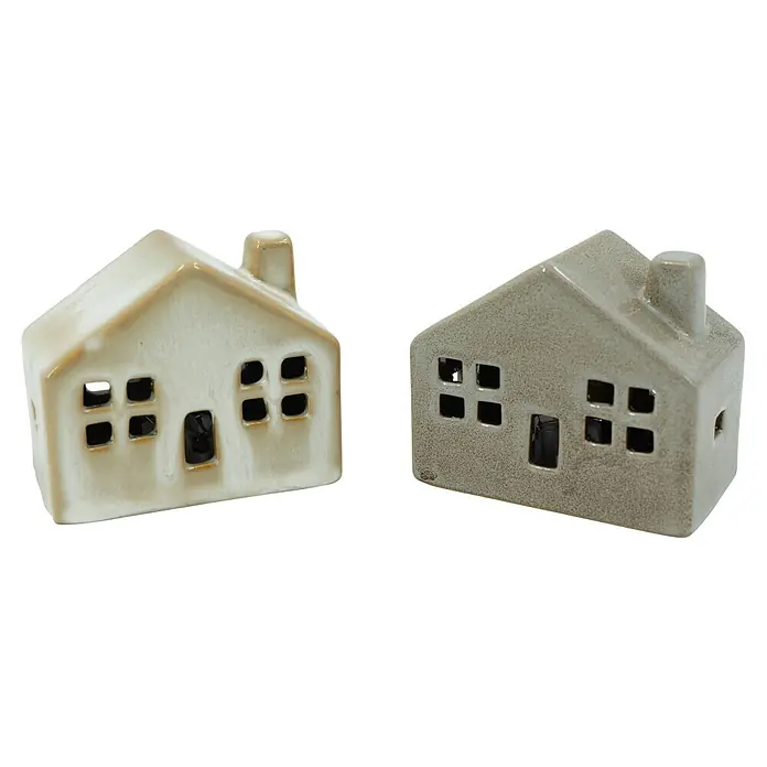 Dekoartikel LED Haus - 1 Stk., Sortiert, 8 x 4,5 x 7 cm - Zwei keramikförmige Teelichthalter in Hausform, einer hellbeige, einer grau, mit ausgestanzten Fenstern.