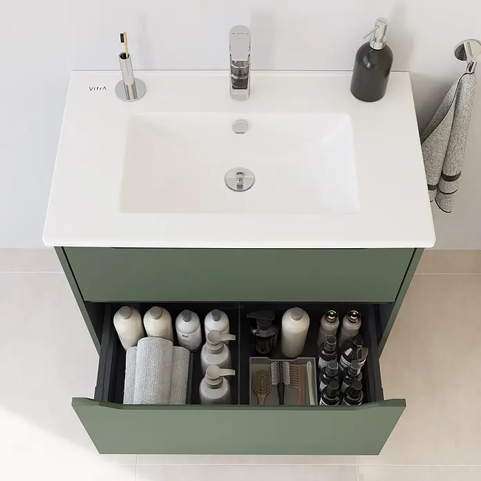 VitrA Integra Square Badmöbel-Set - Gesamtbreite Badmöbel: 80 cm, Moosgrün, Matt - Grüner Badezimmerschrank mit weißem Waschbecken und offener Schublade, organisiert mit Pflegeprodukten.