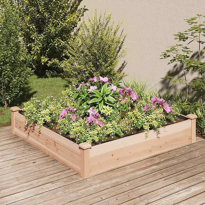 Furnicato Hochbeet - 120 x 120 x 25 cm, Holz, Natur - L-förmiges Hochbeet aus hellem Holz mit bunten Blumen auf einer Terrasse.
