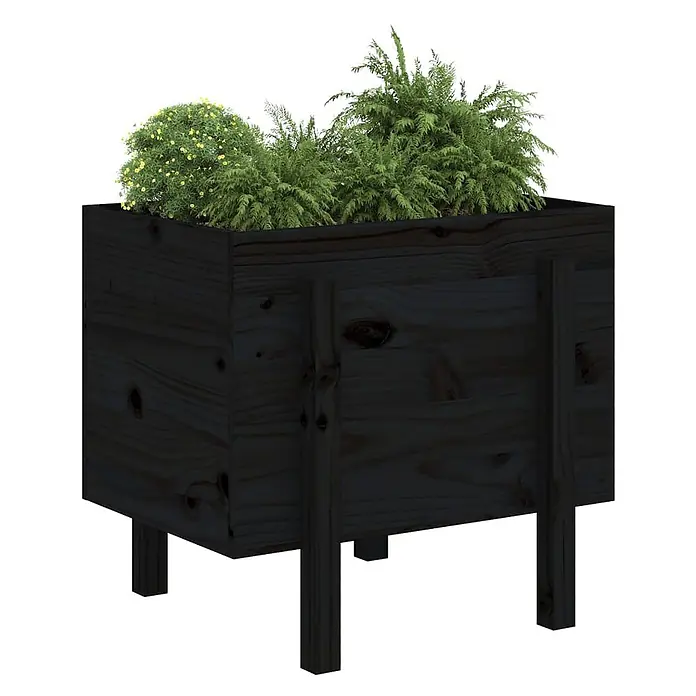 Furnicato Hochbeet - 50 x 62 x 57 cm, Holz, Schwarze Kiefer - Dunkler Holz-Pflanzkasten auf Beinen mit grünen Pflanzen und gelben Blüten.