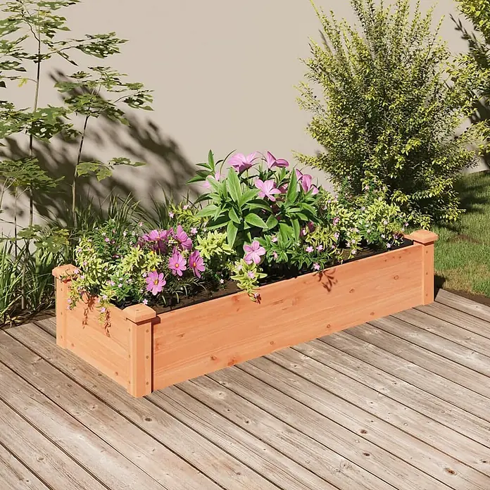 Furnicato Hochbeet - 120 x 45 x 25 cm, Holz, Braun - Rechteckiges, hölzernes Hochbeet mit bunten Blumen auf einer Holzterrasse.