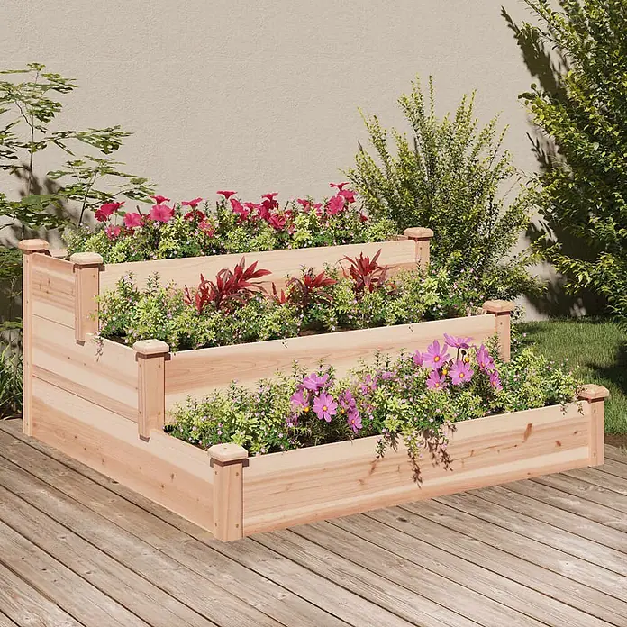 Furnicato Hochbeet - 120 x 120 x 56 cm, Holz, Natur - Gestuftes Hochbeet aus Naturholz mit Pflanzen und Blumen auf einer Terrasse.