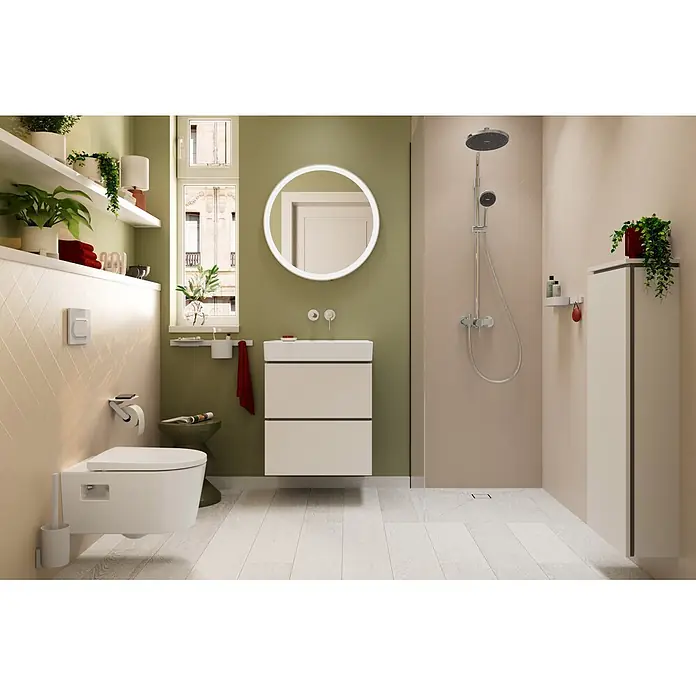 Hansgrohe Sistema de ducha Activera - Con grifo monomando, Número de tipos de chorro: 2 ud., Cromo - Baño moderno con inodoro suspendido, mueble lavabo blanco, espejo redondo iluminado y ducha, decorado con plantas.