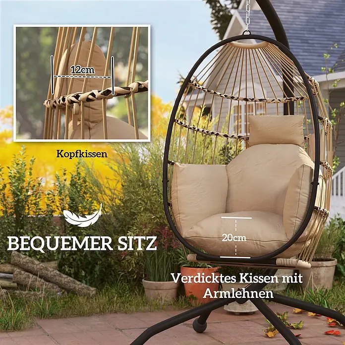 Outsunny Hängesessel - L x B x H: 120 x 88 x 192 cm, Khaki - Ein Hänge-Ei-Stuhl für den Außenbereich mit schwarzem Gestell und geflochtener beigefarbener Sitzfläche, dicken Kissen und Kopfkissen, steht in einem Garten.
