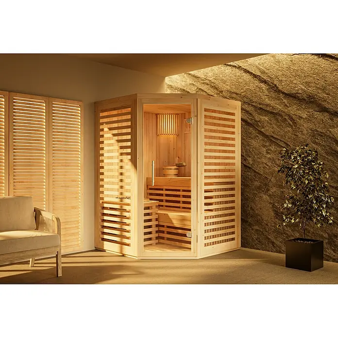 FinnTherm Massivholzsauna Svala -  - Hölzerne Saunakabine mit Innenbeleuchtung in einem modernen Wellnessraum.