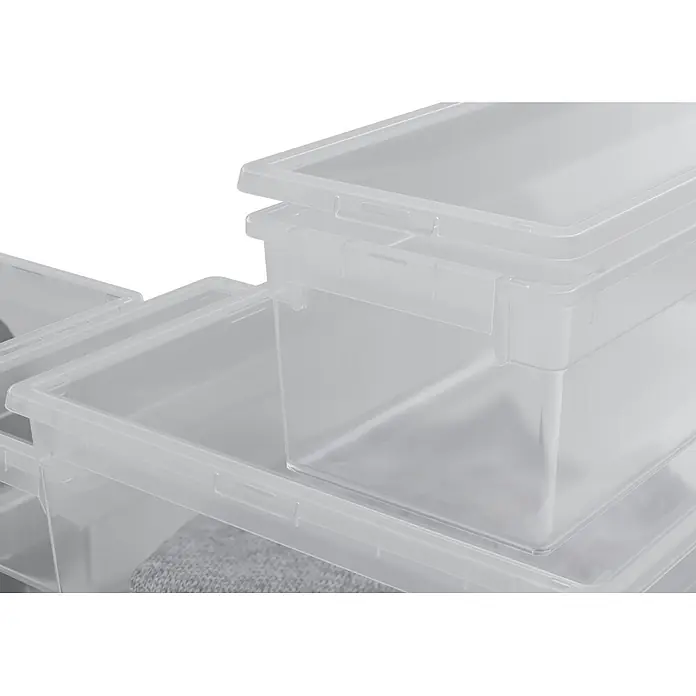 BAUHAUS Caja de almacenaje Light Box - L x An x Al: 39,6 x 57,8 x 18,5 cm, Plástico, Transparente, 36 l - Cajas de almacenamiento de plástico transparente apiladas, algunas con tapa.