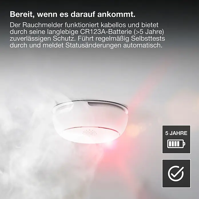 Osram Rauchwarnmelder Smoke Detector - Durchmesser: 8,6 cm, Batterielaufzeit: 5 Jahre, Alarmsignal: 85 dB, 1 Stk. - Ein weißer Rauchmelder mit rotem Licht, der Rauch an einer Decke erkennt. Lange Batterielebensdauer und Selbsttests.