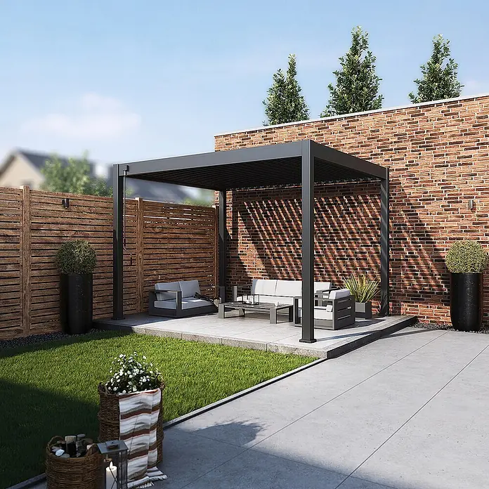 Weide Pergola Classic 3 x 3,6 M Anthrazit - Farbe Gestell: Anthrazit, Aluminium - Moderne dunkelgraue Pergola spendet Schatten über einem Außenwohnbereich.