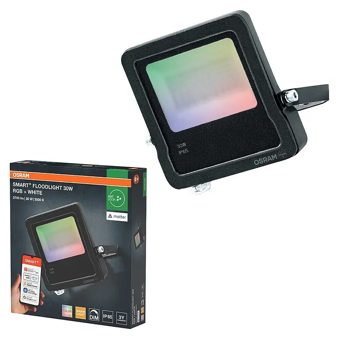 Ledvance Smart+ WiFi LED-Außenwandleuchte Flood - 30 W, 20,9 x 16,8 x 3 cm, RGBW - Schwarzer OSRAM SMART+ 30W RGB+White Fluter neben seiner Verpackung, die Smart Home-Kompatibilität und Outdoor-Funktionen hervorhebt.