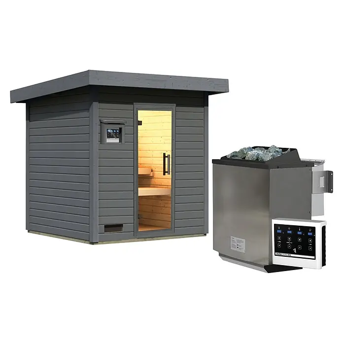 Karibu Saunahaus Kaapi 3 - 9 KW Bio-Ofen mit externer Steuerung, Anthrazit, L x B x H: 196 x 196 x 228 cm - Graue Außensauna mit Glastür und hellem Holz, daneben ein Edelstahlofen mit Steinen und digitalem Bedienfeld.