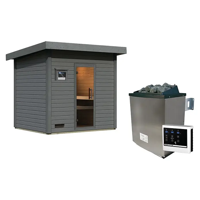 Karibu Saunahaus Kaapi 4 - 9 KW Ofen mit externer Steuerung, Anthrazit, L x B x H: 196 x 231 x 238 cm - Graue Holz-Außensauna-Kabine neben einem Edelstahl-Saunaofen mit Steinen und weißem Bedienfeld.