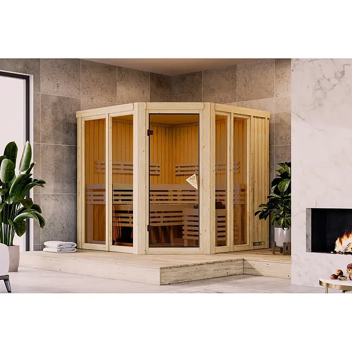 Karibu Elementsauna Bragi - L x B x H: 196 x 196 x 198 cm, Plug & Play 3,6 KW Ofen mit interner Steuerung - L-förmige Holzsauna mit Glaspaneelen auf einer erhöhten Plattform in einem modernen Spa-Raum.