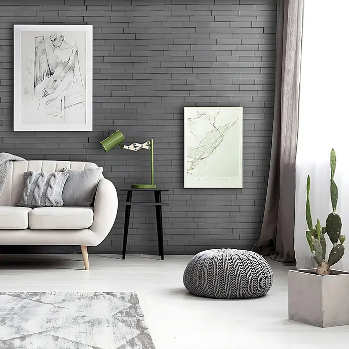 Profhome Wandpaneel 3D 705257 Piano Steps Smoked Gray Dekorpaneel in Stein Optik grau 2 m2 - 610 x 600 mm - Dunkelgraue Wandpaneele mit Ziegelmuster als Akzentwand in einem modernen Wohnzimmer.