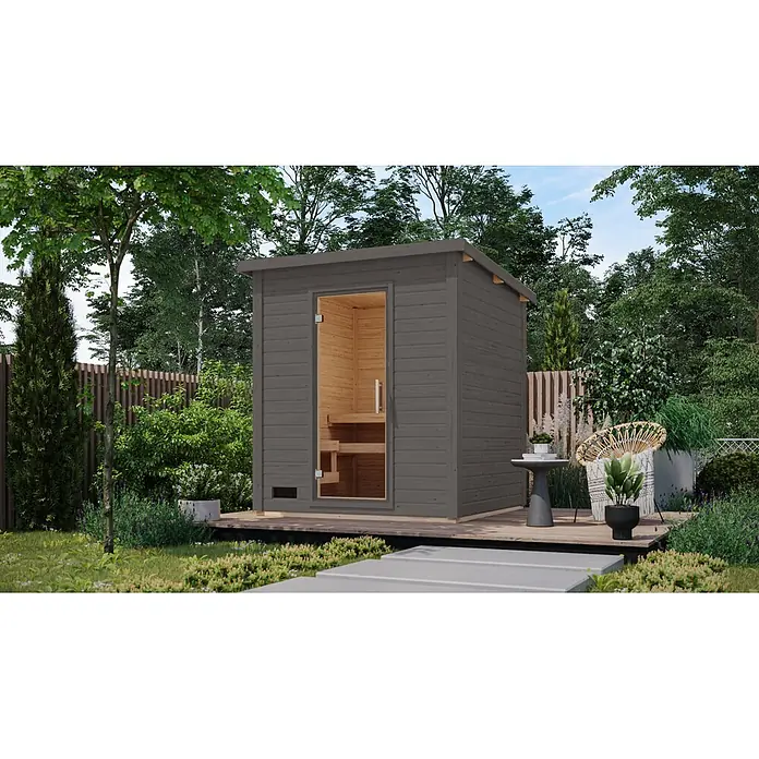 Karibu Saunahaus Kaapi 3 - 9 KW Ofen mit externer Steuerung, Anthrazit, L x B x H: 196 x 196 x 228 cm - Dunkelgraue Außensauna mit Holzinterieur, auf einer Holzterrasse.